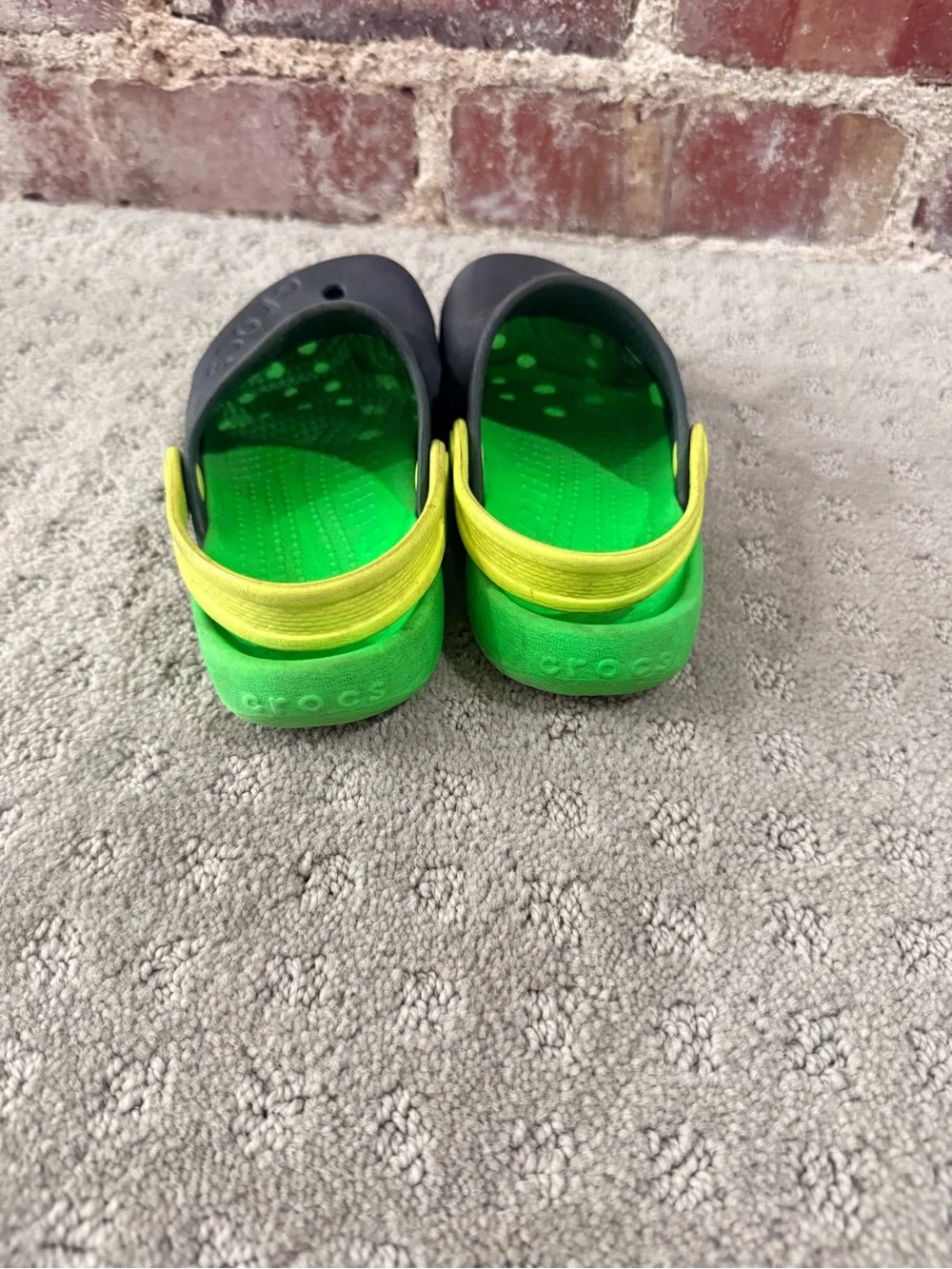CROCS Kids Black Clog with Lime Green Footbed and Yellow Heel Strap